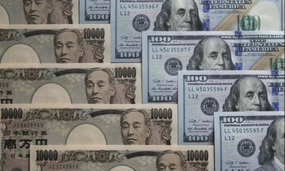 تراجع مؤشر الدولار من أعلى مستوى له منذ مايو