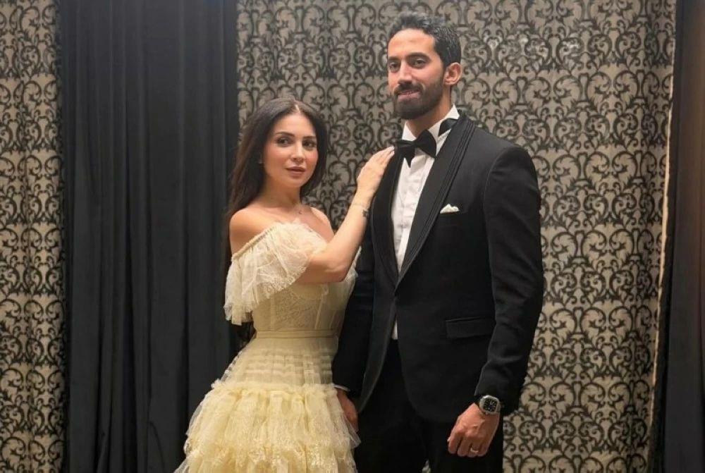 مي عز الدين وزوجها 