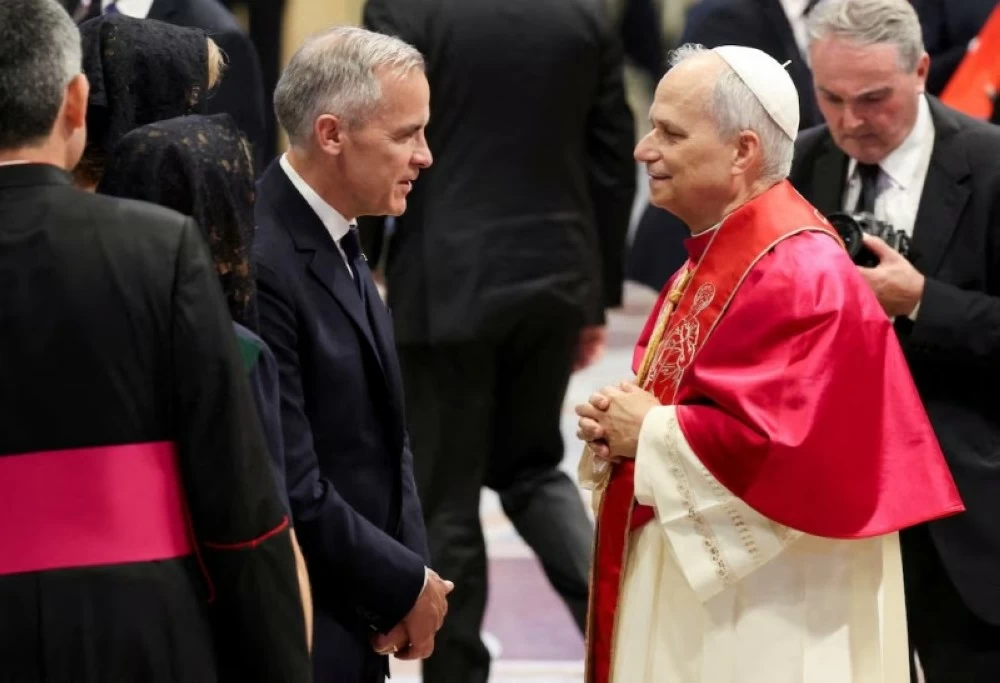 بابا الفاتيكان ورئيس وزراء كندا.