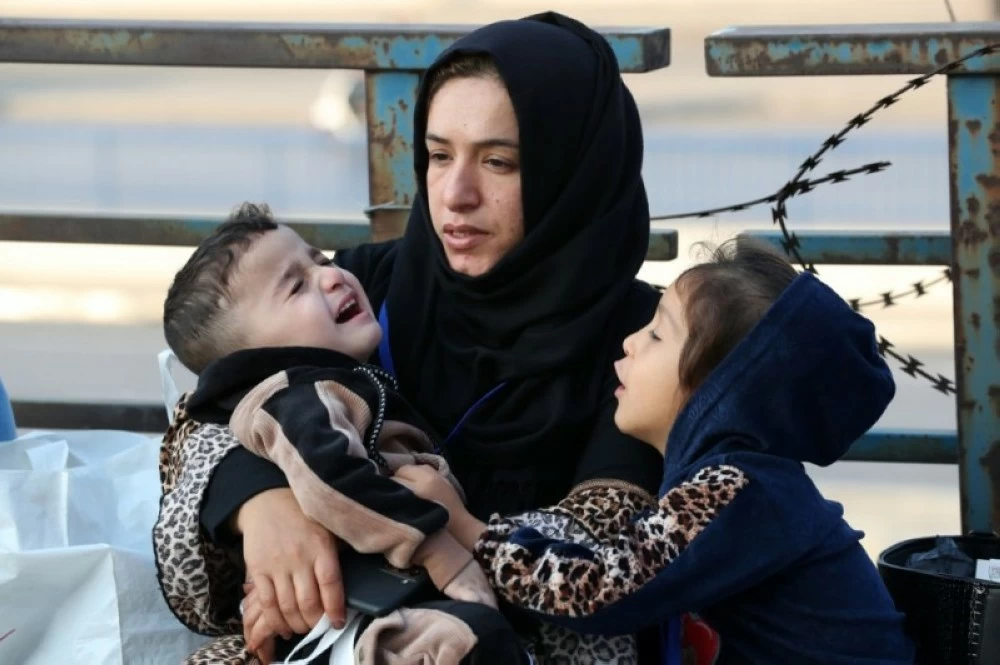 عائلة سورية تستعد للعودة من بيروت إلى دمشق.(إ ب أ)