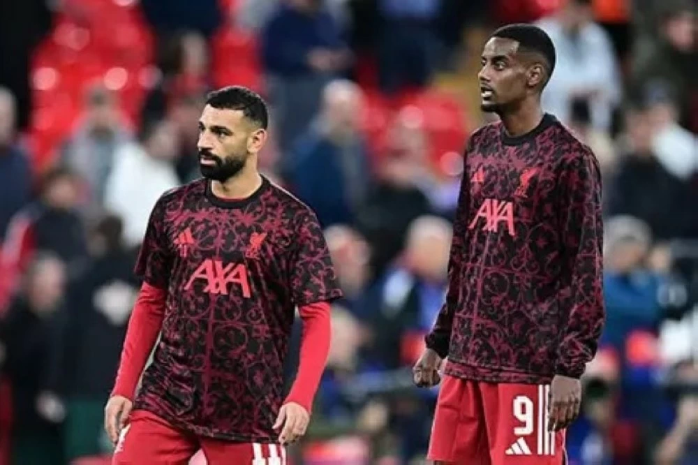 ألكسندر إيزاك ومحمد صلاح