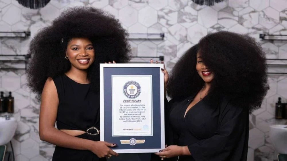 امرأة تدخل موسوعة غينيس بـ«أضخم شعر طبيعي»