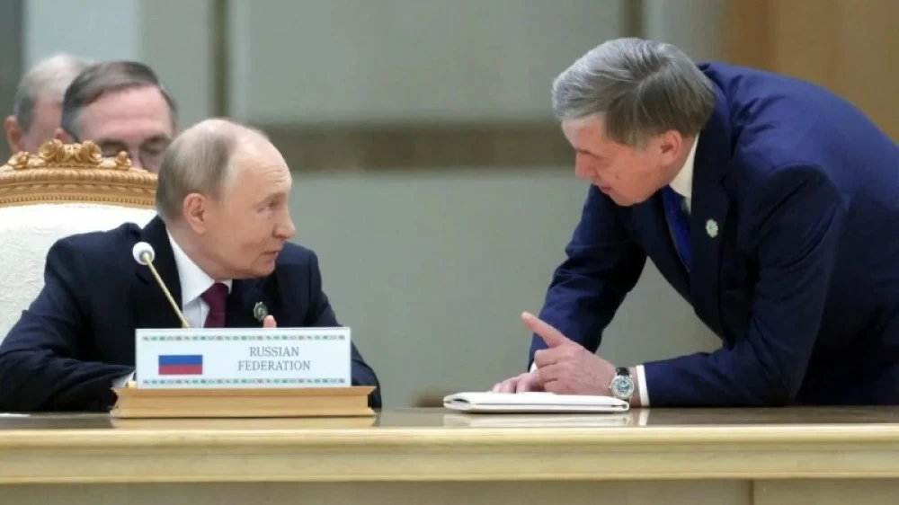 الرئيس الروسي ومستشاره أوشاكوف