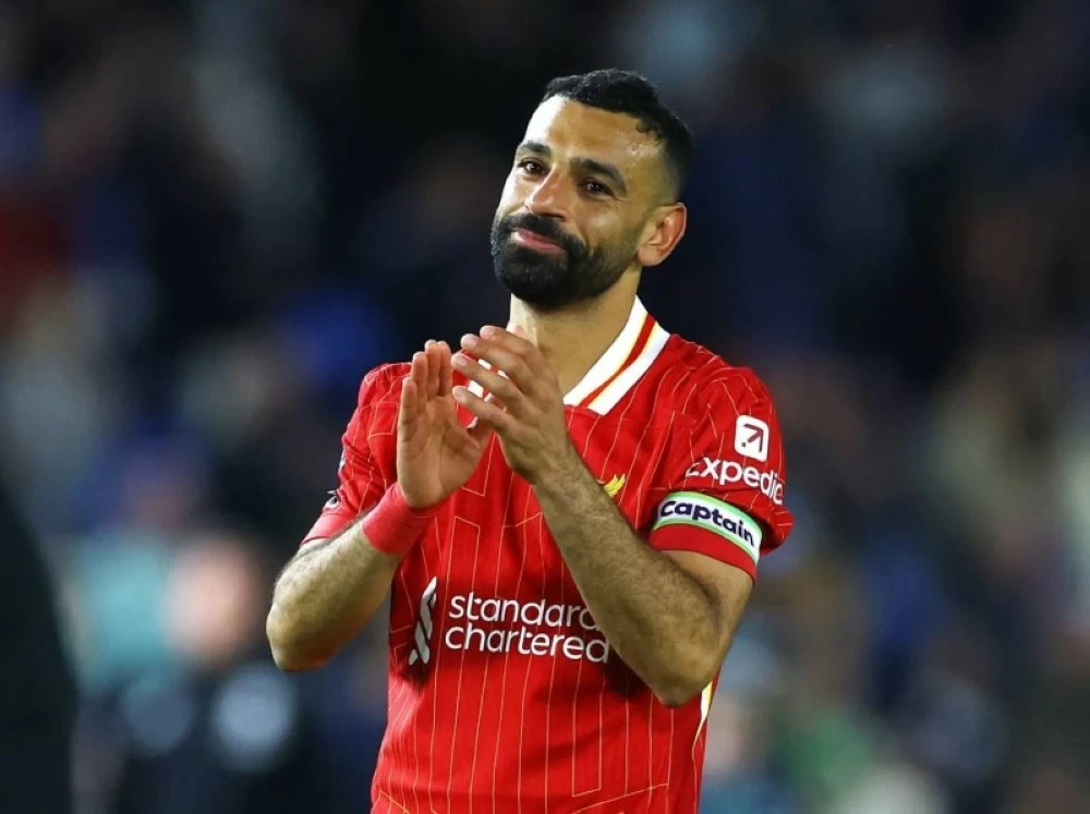 محمد صلاح ومدرب ليفربول أرني سلوت
