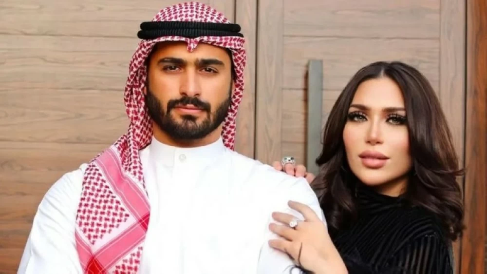 الدكتورة خلود وزوجها.