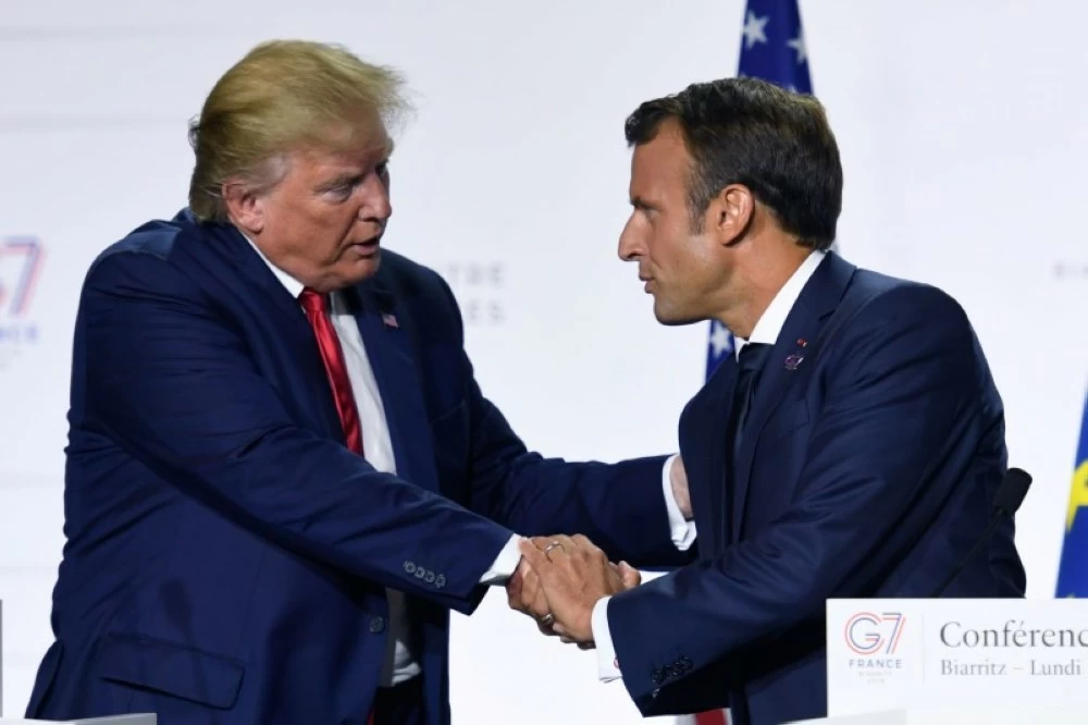 ترمب يهاجم ماكرون ويهدد فرنسا بـ 200% رسوم جمركية. للاطلاع على 