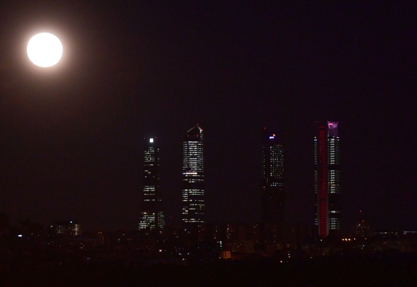 A Supermoon rises above Madrid on November 14, 2016.   The phenomenon happens when the moon is full at the same time as, or very near, perigee -- its closest point to Earth on an elliptical, monthly orbit. It was the closest to Earth since 1948 at a distance of 356,509 kilometres (221,524 miles), creating what NASA described as 