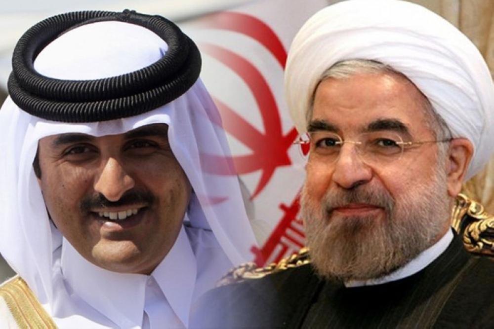 الشيخ تميم بن حمد آل ثاني والرئيس الإيراني روحاني