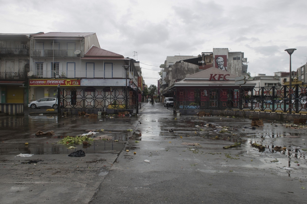 A picture taken on September 6, 2017 shows the empty market square in Pointe-a-Pitre, on the French overseas island of Guadeloupe, after high winds from Hurricane Irma hit the island. Monster Hurricane Irma slammed into Caribbean islands today after making landfall in Barbuda, packing ferocious winds and causing major flooding in low-lying areas. As the rare Category Five storm barreled its way across the Caribbean, it brought gusting winds of up to 185 miles per hour (294 kilometers per hour), weather experts said.
 / AFP / Helene Valenzuela
