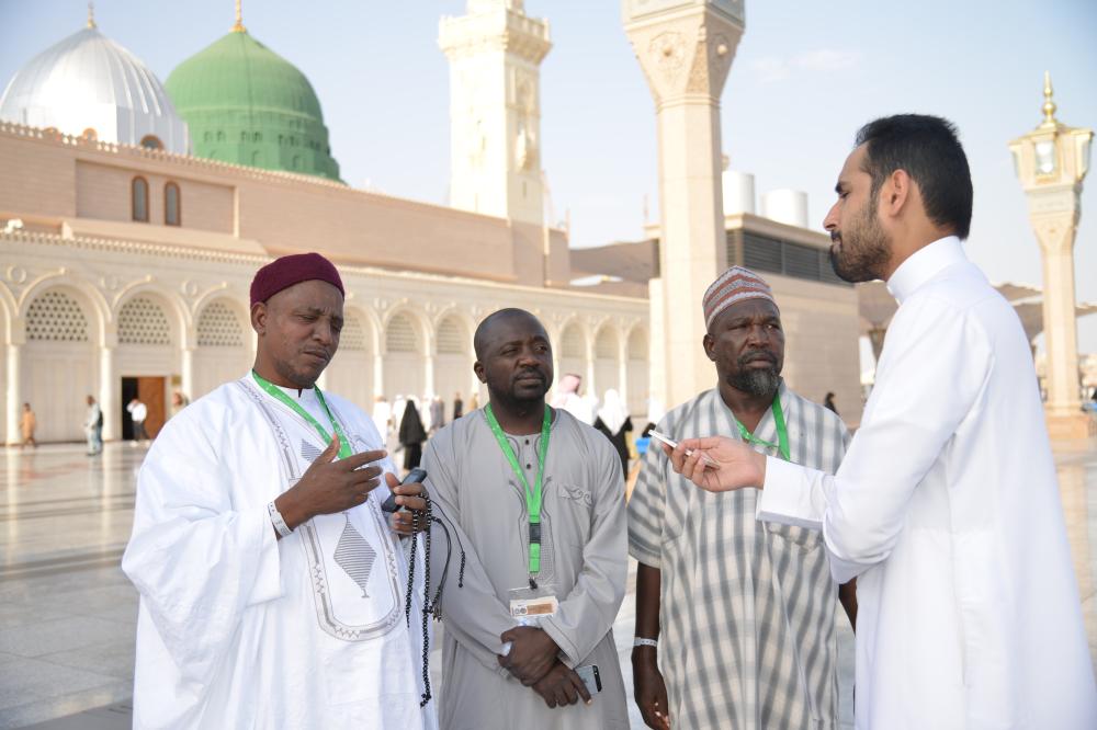 النيجيري مع رفاقه يتحدث للزميل السوقان. (تصوير: حسام كريدي)