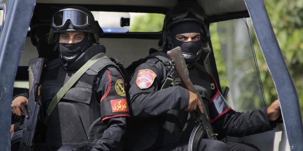 Egyptian special forces secure a convoy carrying Egypt's Prosecutor General Hisham Barakat before his funeral in Cairo, Egypt, Tuesday, June 30, 2015. Barakat was killed by a car bomb on Monday in the country's first assassination of a senior official in 25 years, marking what could be an escalation in a campaign by Islamic militants toward targeting leaders of a crackdown on the Muslim Brotherhood.(AP Photo/Amr Nabil)