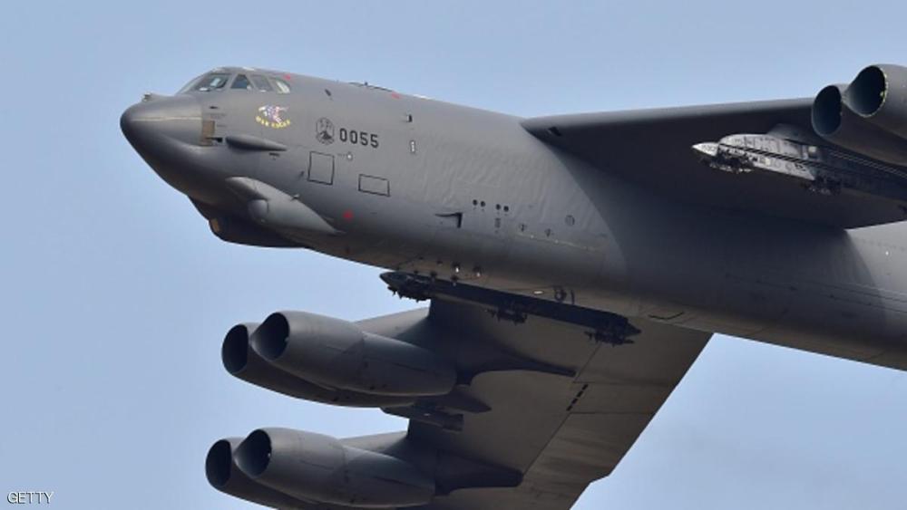 A US B-52 Stratofortress flies over the Osan Air Base in Pyeongtaek, south of Seoul, on January 10, 2016. The US sent a heavy bomber over South Korea on January 10 in a show of force as North Korean leader Kim Jong-Un insisted his country's latest nuclear test was carried out in self-defence. AFP PHOTO / JUNG YEON-JE / AFP / JUNG YEON-JE        (Photo credit should read JUNG YEON-JE/AFP/Getty Images)