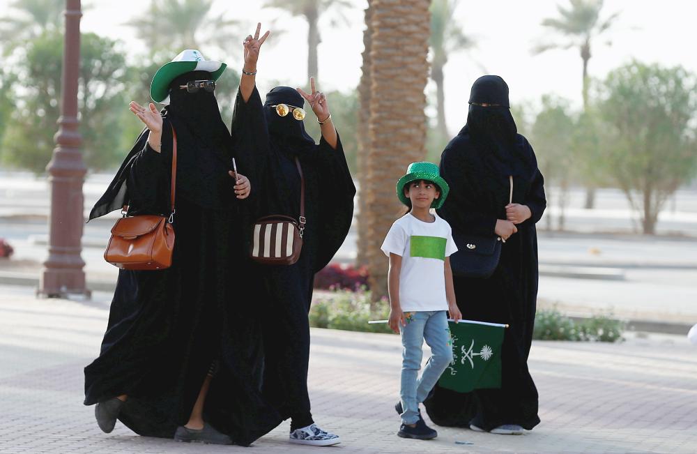 Saudi Arabia women arrive to  a rally to celebrate the 87th annual National Day of Saudi Arabia in Riyadh, Saudi Arabia September 23, 2017. REUTERS/Faisal Al Nasser