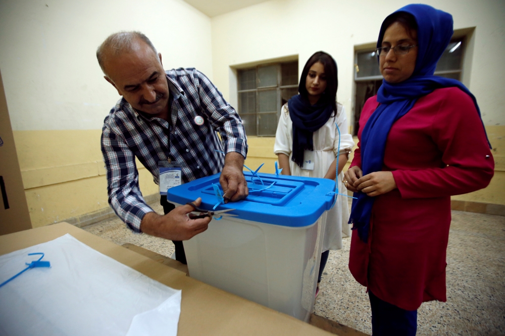 Officials open a ballot box after the close of the polling station during Kurds independence referendum in Erbil, Iraq September 25, 2017. REUTERS/Azad Lashkari