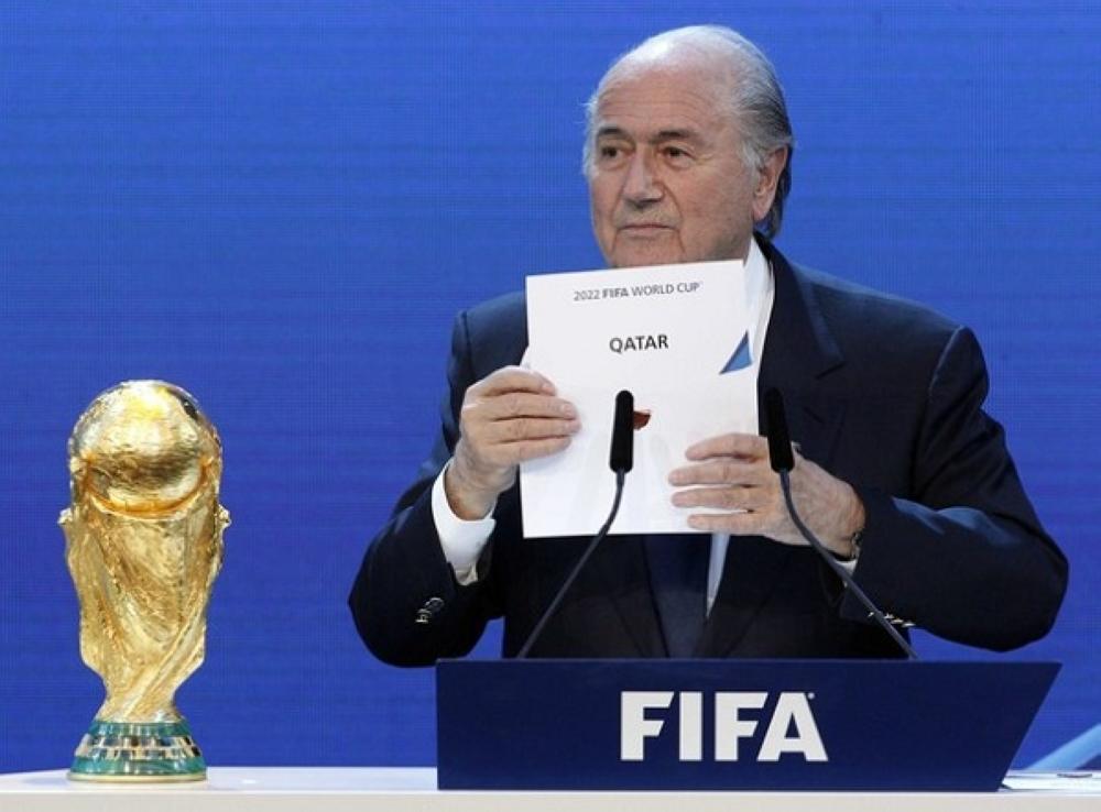 File picture shows FIFA President Sepp Blatter as he announces Qatar as the host nation for the FIFA World Cup 2022, in Zurich December 2, 2010. Blatter will face an ethics investigation alongside his election rival Mohamed bin Hammam after football's governing body widened its enquiry into bribes-for-votes allegations. In shock move on May 27, 2011, FIFA said it was calling Blatter to appear at an ethics hearing on Sunday, three days before he stands against challenger Bin Hammam in the election for the most powerful job in world soccer. Picture taken December 2, 2010.   REUTERS/Christian Hartmann/File (SWITZERLAND  - Tags: SPORT SOCCER)