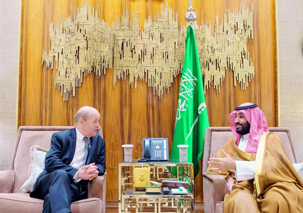 



الأمير محمد بن سلمان مجتمعاً مع وزير الخارجية الفرنسي لودريان أمس في الرياض. (واس)