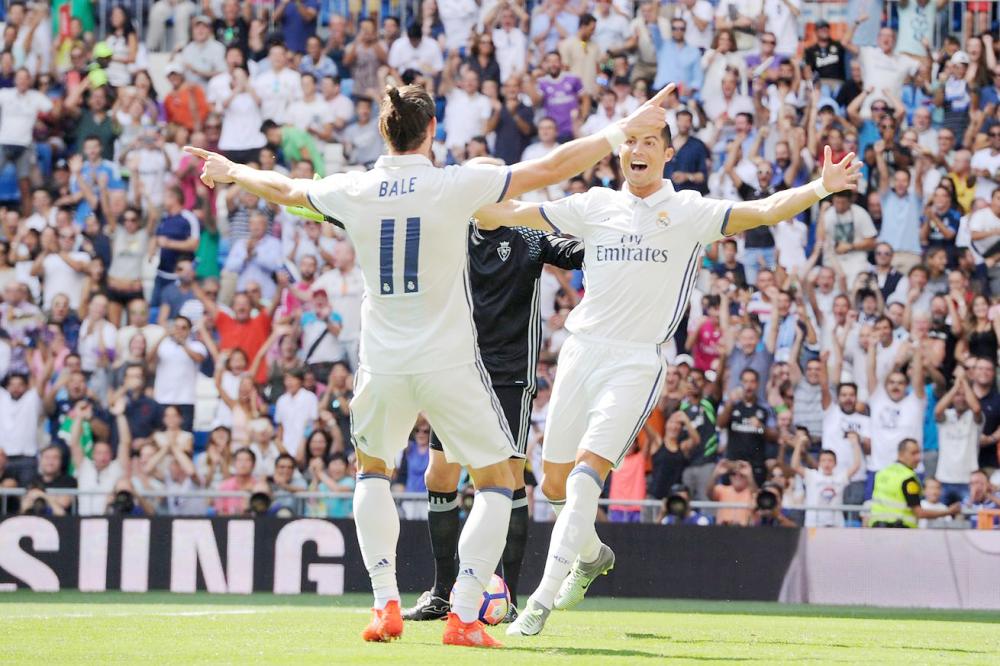 



رونالدو وبيل يحتفلان في مباراة سابقة لريال مدريد.