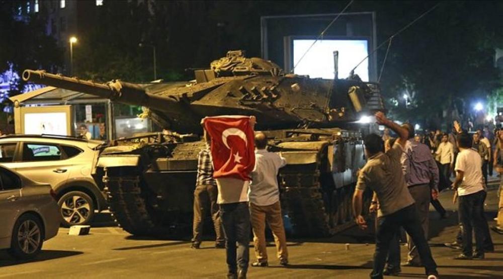 A tank moves into position as Turkish people attempt to stop them, in Ankara, Turkey, early Saturday, July 16, 2016. Turkey's armed forces said it 