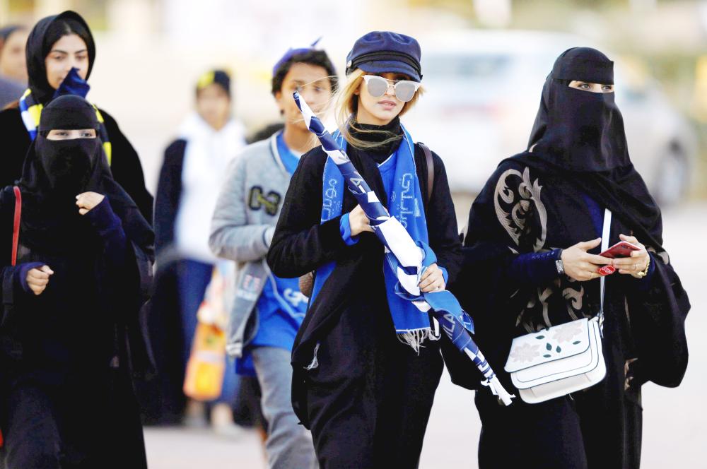 Saudi women arrive to watch the soccer match between Al- Hilal club against Al Ittihad club at the King Fahd stadium in Riyadh, Saudi Arabia January 13, 2018. REUTERS/Faisal Al Nasser