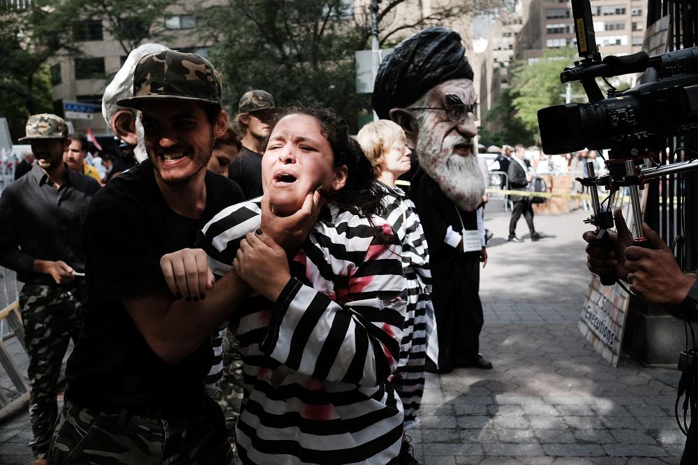 NEW YORK, NY - SEPTEMBER 20: An elaborate play critical of Iran's human rights record is performed during a protest against the Iranian regime outside of the United Nations on September 20, 2016 in New York City. Presidents, prime ministers, monarchs and ministers are gathering this week for the United Nation's General Assembly's annual ministerial meeting. (Photo by Spencer Platt/Getty Images)