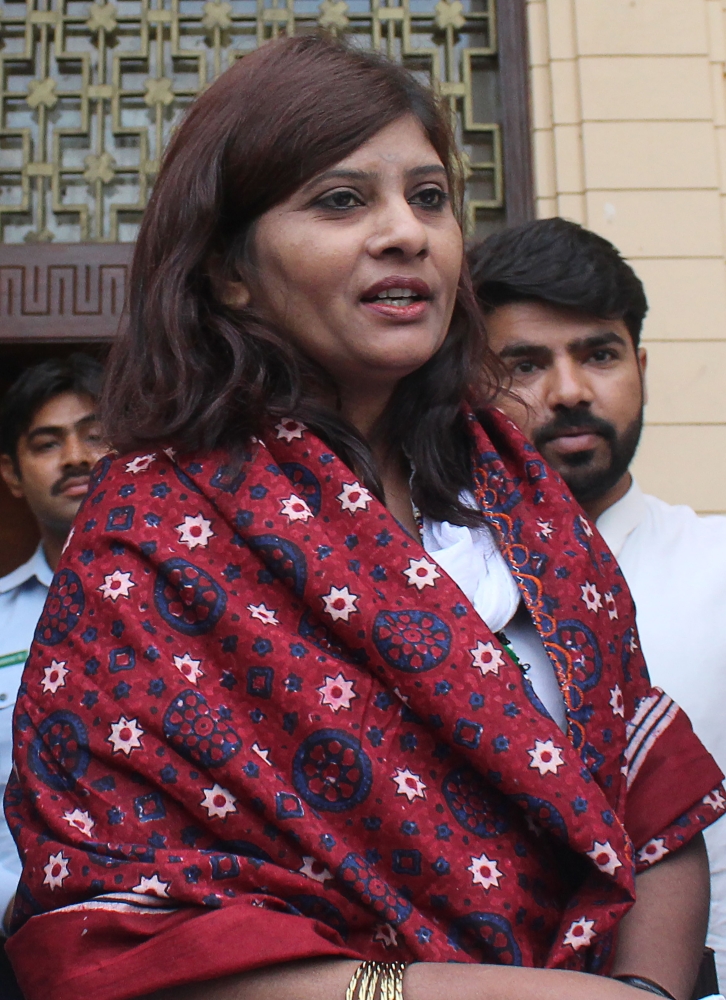 Pakistani opposition candidate Krishna Kumari Kohli walks out from Sindh province assembly after the Senate election in Karachi on Saturday. — AFP