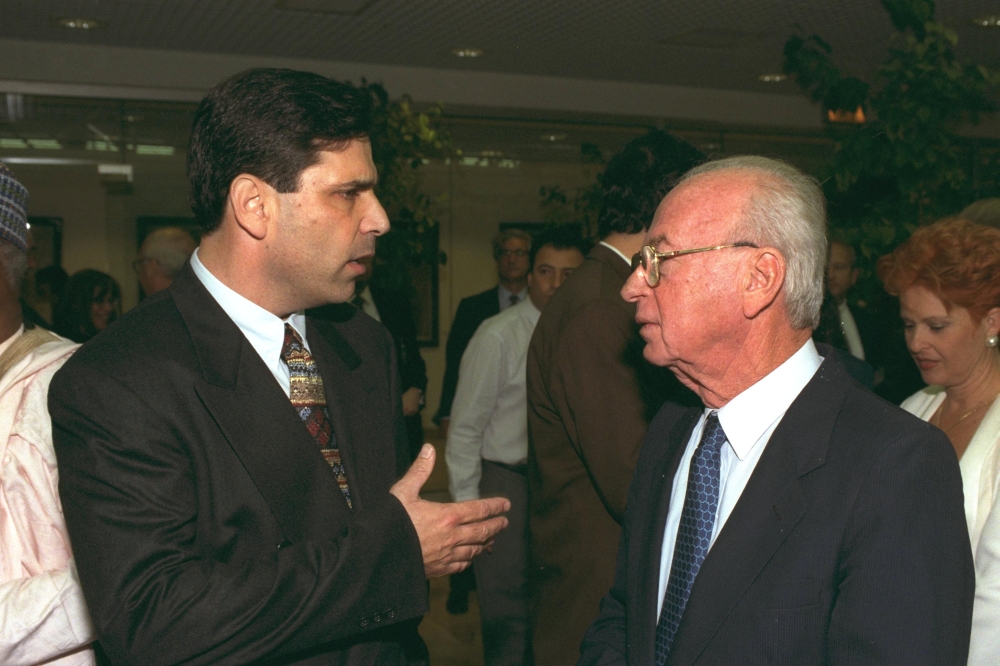 Former Israeli Prime Minister Yitzhak Rabin speaks with former energy minister Gonen Segev during a conference in Jerusalem, in this file photo released by the Israeli Government Press Office (GPO), obtained by Reuters on June 18, 2018. REUTERS/GPO/Handout ATTENTION EDITORS - THIS IMAGE HAS BEEN SUPPLIED BY A THIRD PARTY. ISRAEL OUT.