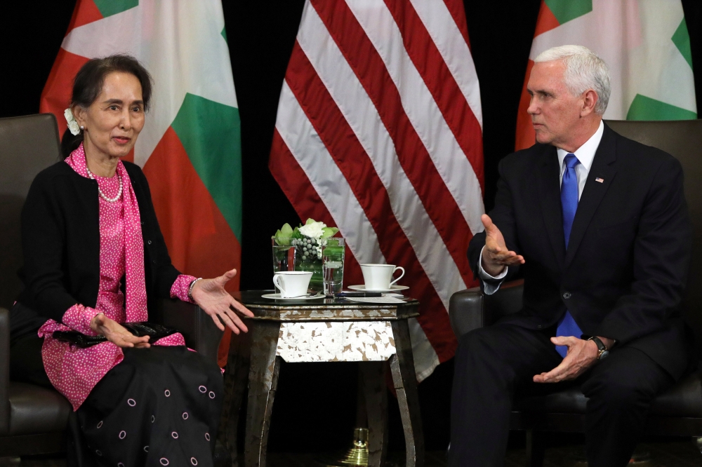 Myanmar's State Counsellor Aung San Suu Kyi and U.S. Vice President Mike Pence hold a bilateral meeting in Singapore, November 14, 2018. REUTERS/Athit Perawongmetha