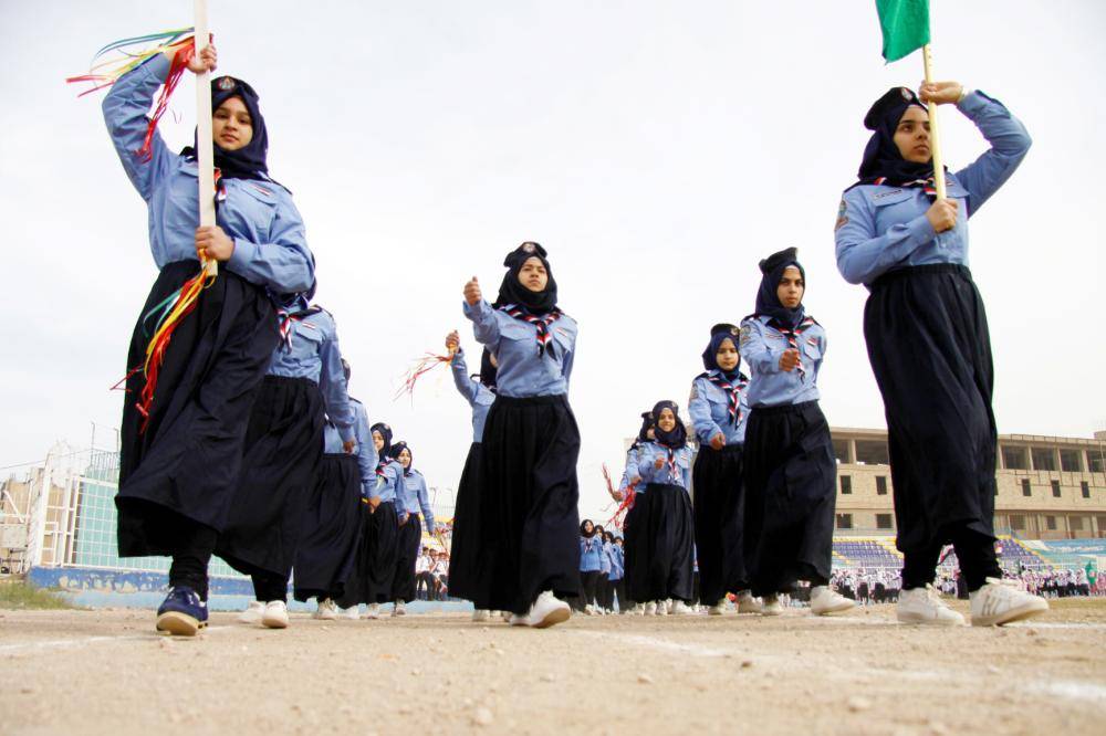 



طالبات عراقيات يحتفلن بـ«يوم الشرطة» في مدينة النجف أمس. (أ ف ب)