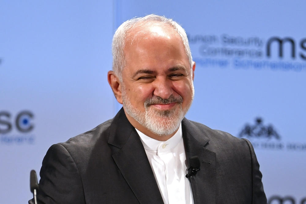 Iran's Foreign Minister Mohammad Javad Zarif smiles during the annual Munich Security Conference in Munich, Germany February 17, 2019. REUTERS/Andreas Gebert