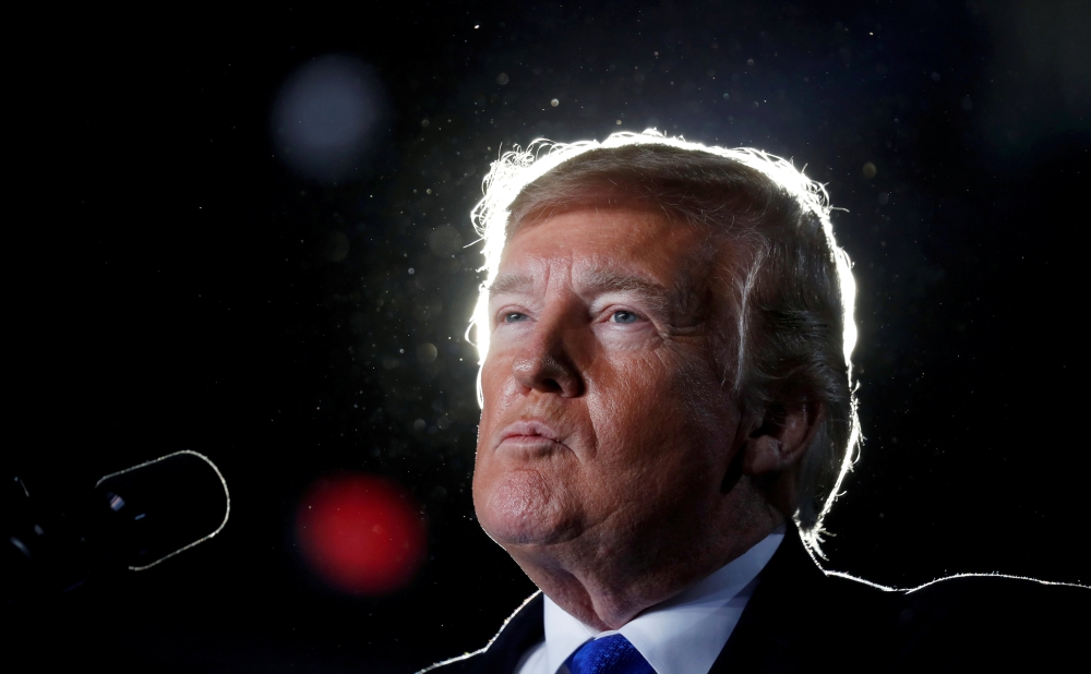 U.S. President Donald Trump speaks about the crisis in Venezuela during a visit to Florida International University in Miami, Florida, U.S., February 18, 2019. REUTERS/Kevin Lamarque TPX IMAGES OF THE DAY