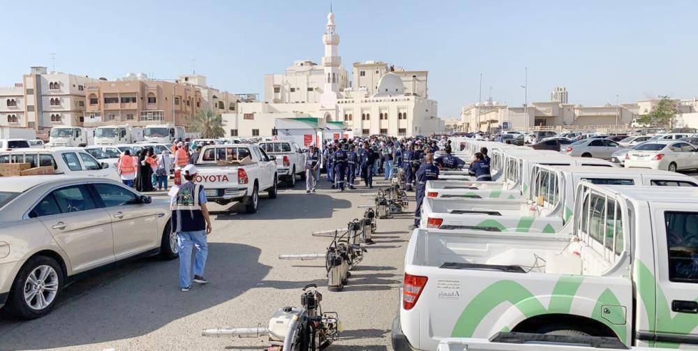 



فريق مشترك بين الأمانة والصحة للحملة.