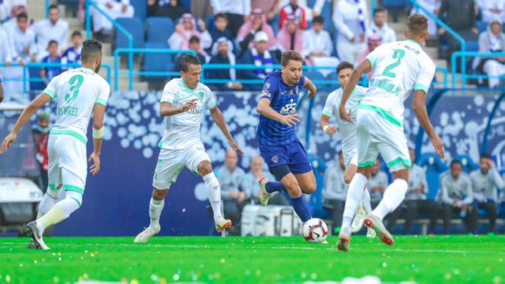 



الأهلي والهلال في لقاء سابق.