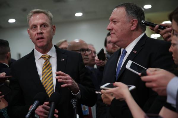 WASHINGTON, DC - MAY 21: Acting U.S. Defense Secretary Patrick Shanahan (L) speaks to members of the media as Secretary of State Mike Pompeo (R) listens after a closed briefing for Senate members May 21, 2019 on Capitol Hill in Washington, DC. Acting Secretary Shanahan and Secretary Pompeo joined Chairman of Joint Chiefs of Staff Joseph Dunford to brief Congressional members on Iran. Alex Wong/Getty Images/AFP == FOR NEWSPAPERS, INTERNET, TELCOS & TELEVISION USE ONLY == 