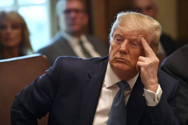 US President Donald Trump participates in a Cabinet meeting at the White House on July 16, 2019 in Washington,DC. / AFP / Nicholas Kamm 