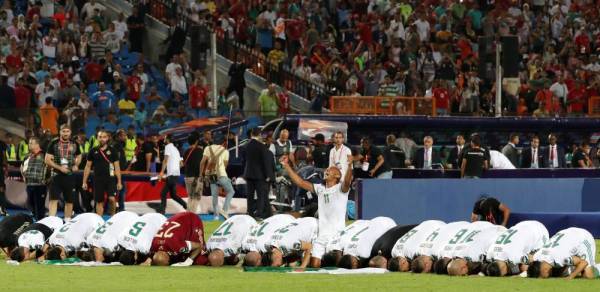 Soccer Football - Africa Cup of Nations 2019 - Final - Senegal v Algeria - Cairo International Stadium, Cairo, Egypt - July 19, 2019    Algeria's Yacine Brahimi with team mates celebrate in front of their fans after winning the Africa Cup of Nations      REUTERS/Mohamed Abd El Ghany