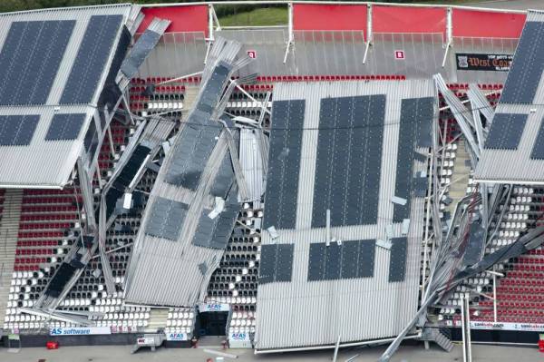 An aerial photograph taken on August 11, 2019 shows the collapsed roff of the AZ Alkmaar football club's AFAS Stadium in Alkmaar due to strong gusts of wind the day before. High winds caused part of Dutch club AZ Alkmaar's stadium to collapse with officials relieved that the ground was empty at the time. Dramatic pictures emerged of the damage to the 17,000-capacity AFAS stadium in the northern Dutch city which was built 13 years ago.
 - Netherlands OUT
 / AFP / ANP / -
