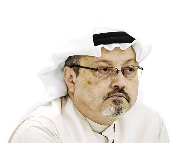 A general manager of Alarab TV, Jamal Khashoggi, looks on during a press conference in the Bahraini capital Manama, on December 15, 2014. The  pan-Arab satellite news broadcaster owned by billionaire Saudi businessman Alwaleed bin Talal will go on air February 1, promising to 