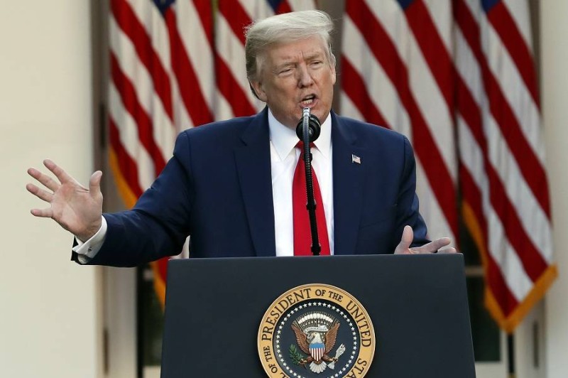 President Donald Trump speaks about the coronavirus in the Rose Garden of the White House, Monday, April 27, 2020, in Washington. Trump says states should “seriously consider” reopening their public schools before the end of the academic year, even though dozens already have said it would be unsafe for students to return until the summer or fall. (AP Photo/Alex Brandon)