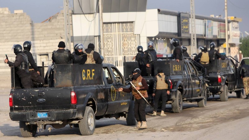 Iraqi security forces are seen on military vehicles during ongoing anti-government protests in Basra, Iraq November 24, 2019. REUTERS/Essam al-Sudani