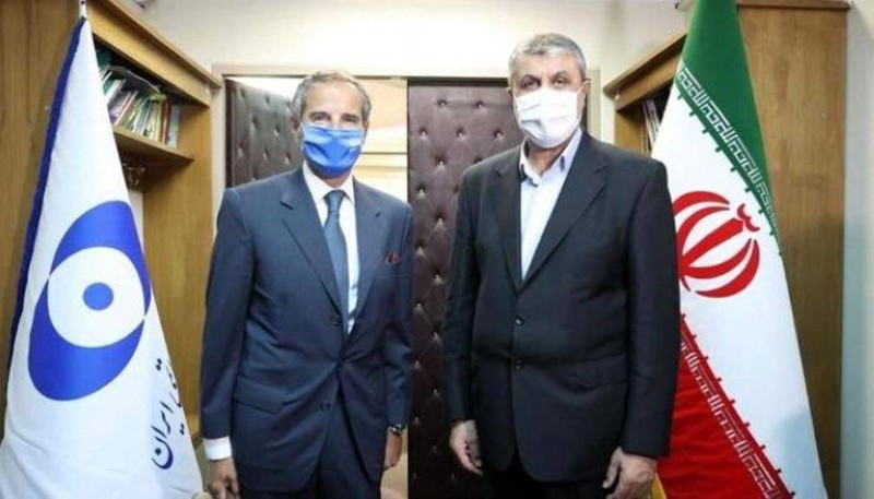 مدير الوكالة الدولية ووزير خارجية إيران.