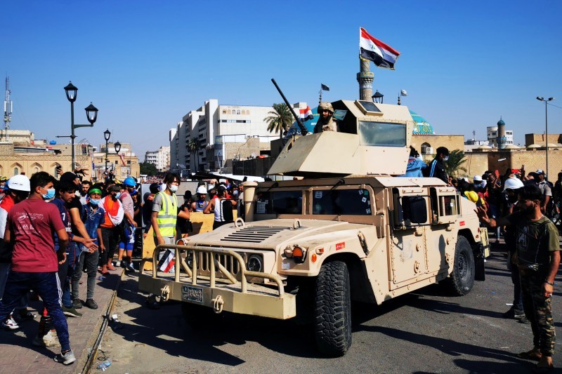 قوات الجيش العراقي أثناء اقتحام قرية لهيبان.