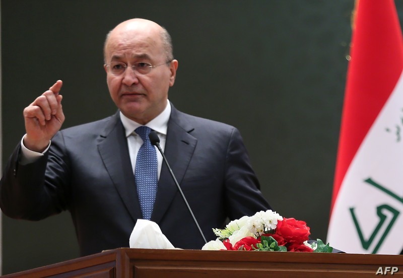 A picture released by the Iraqi Parliament shows the newly elected Iraqi President Kurdish Barham Saleh delivering a speech on October 2, 2018 at the parliament in Baghdad.
The moderate Kurdish candidate was elected president of Iraq today in a parliamentary vote pitting two heavyweight Kurdish parties against each other for the first time. The 58-year-old Patriotic Union of Kurdistan candidate faced Fuad Hussein, backed by former Kurdish leader Massud Barzani who was the architect of an ill-fated independence referendum in 2017. / AFP PHOTO / IRAQI PARLIAMENT / STRINGER / == RESTRICTED TO EDITORIAL USE - MANDATORY CREDIT «AFP PHOTO / HO / IRAQI PARLIAMENT» - NO MARKETING NO ADVERTISING CAMPAIGNS - DISTRIBUTED AS A SERVICE TO CLIENTS ==
 
 