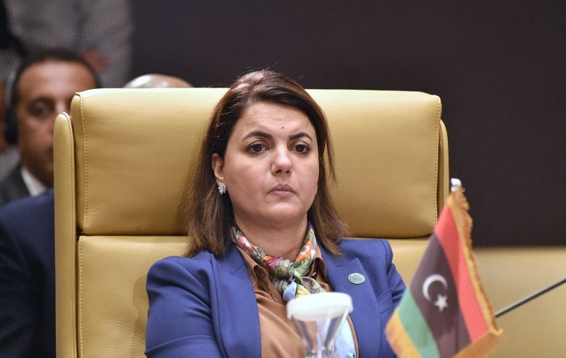 Libya's Foreign Minister Najla al-Mangoush attends a meeting by Libya's neighbours as part of international efforts to reach a political settlement to the country's conflict, in the Algerian capital Algiers, on August 30, 2021. (Photo by RYAD KRAMDI / AFP)