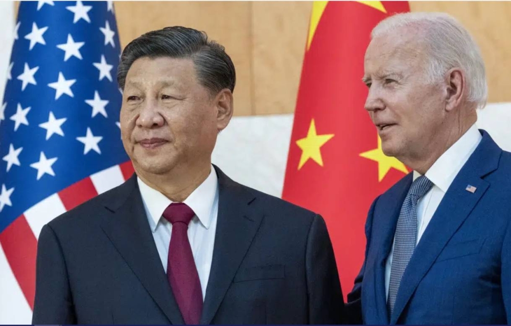 اتهمت الصين الولايات المتحدة بمحاولة عرقلة نموها. ويبدو الرئيسان الأمريكي والصيني في آخر لقاء بينهما. (وكالات) 