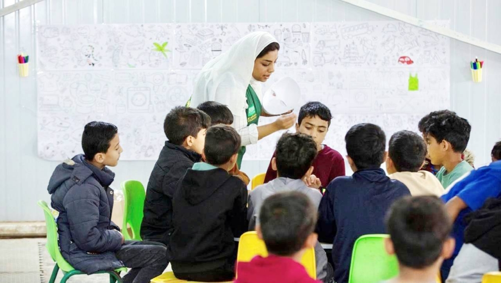 



أطفال في مخيم الزعتري يتفاعلون مع برنامج لتقوية المهارات الإبداعية والاجتماعية. (واس)